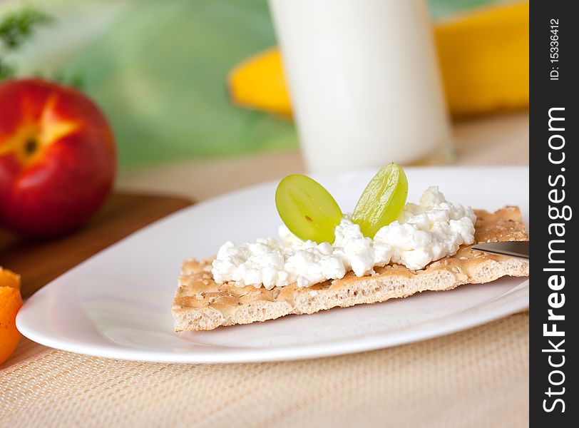Crispbread on a plate with cottage cheese. Crispbread on a plate with cottage cheese