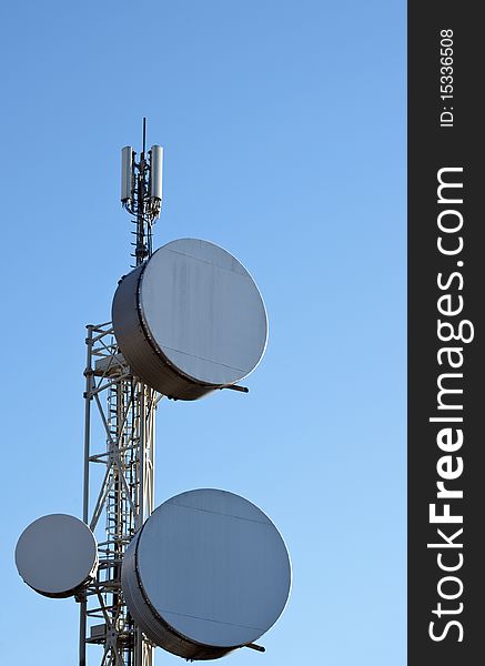 An antenna for communications background of blue sky