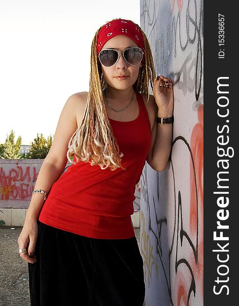 Young Female Hipster In Red