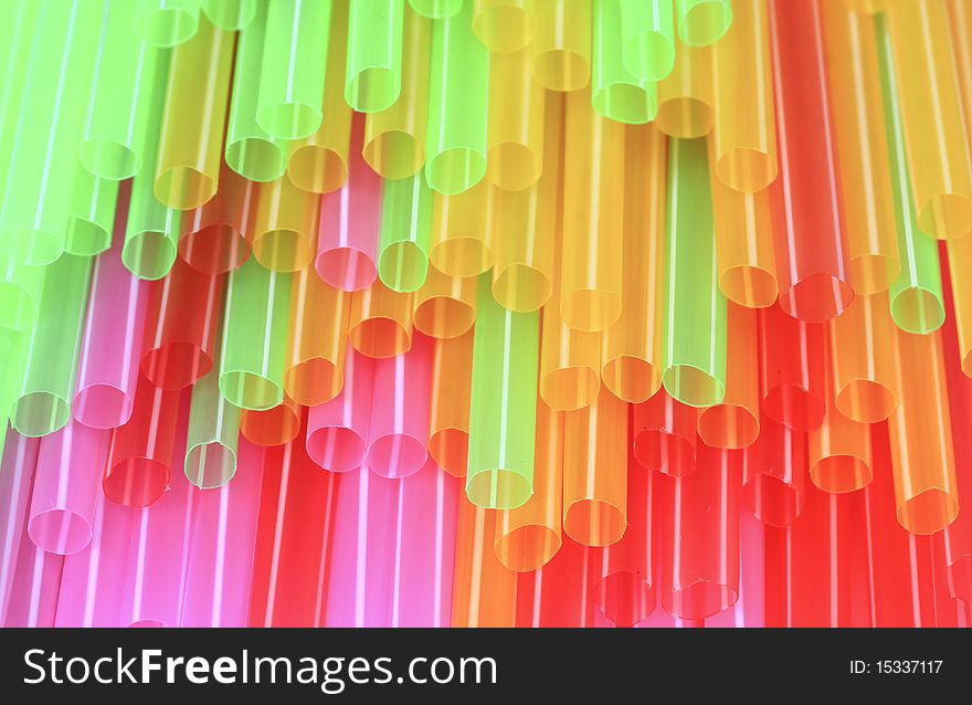 Colorful drinking straws background