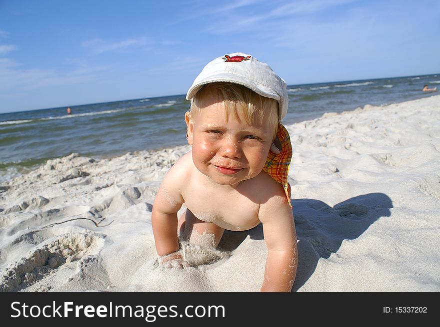 Small boy over sea, fun on beach