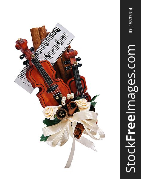 Souvenir in the form of a violins on white background (isolated). Souvenir in the form of a violins on white background (isolated)