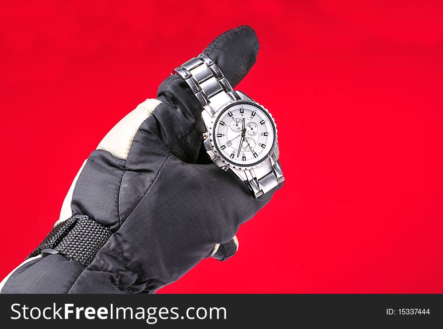 Glove hand with wrist watch for advertisement purpose.