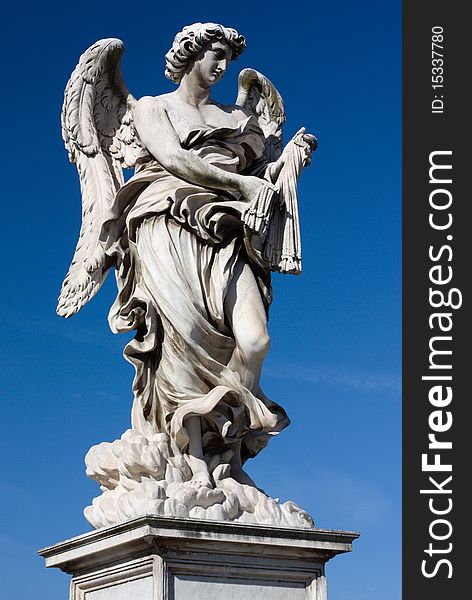 Bernini's marble statue of angel from the Sant'Angelo Bridge in Rome, Italy. Bernini's marble statue of angel from the Sant'Angelo Bridge in Rome, Italy