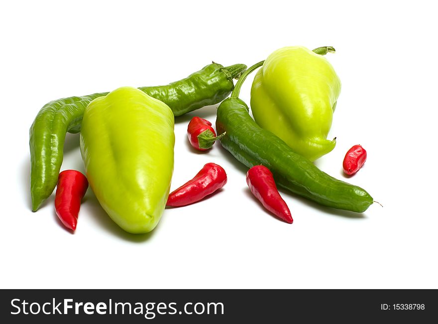 Red and green peppers isolated on white background. Red and green peppers isolated on white background.