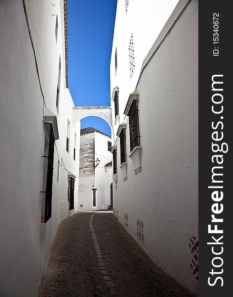 Narrow street in Arcos de la Frontera, in the Cadiz province, Spain.