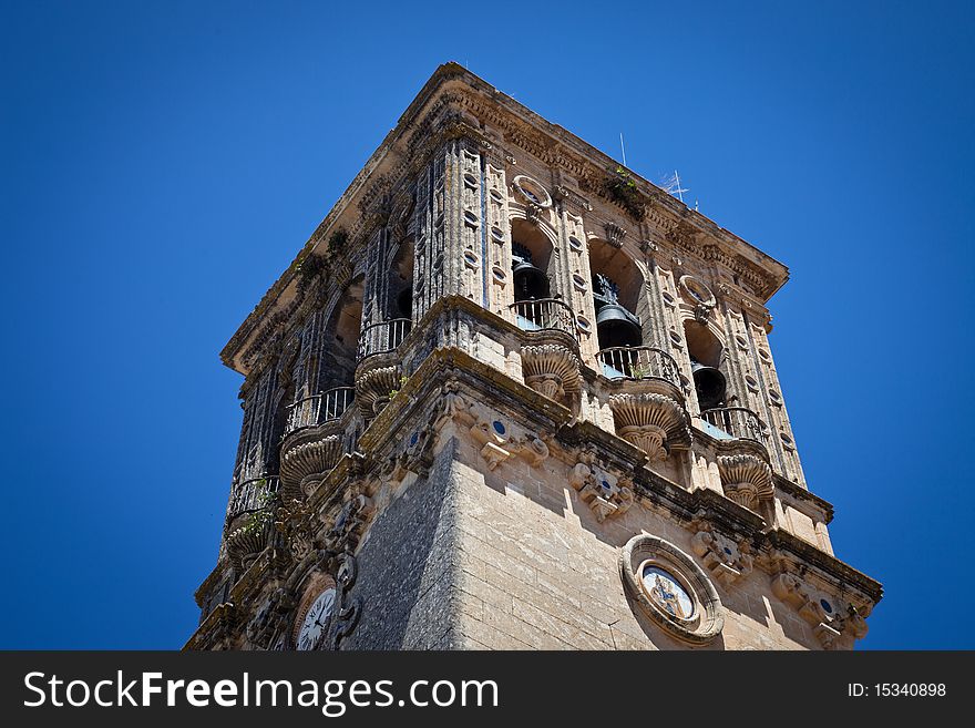 Santa Maria church's bell tower in Arcos de la Frontera, Cadiz - Spain. Santa Maria church's bell tower in Arcos de la Frontera, Cadiz - Spain