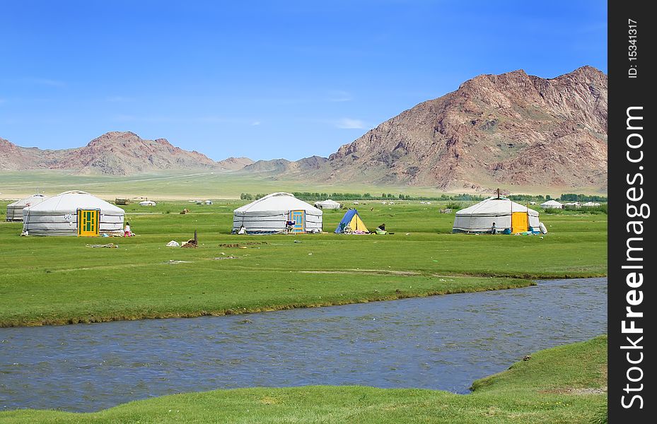 Traditional mongolian yurts in beautiful valley. Traditional mongolian yurts in beautiful valley
