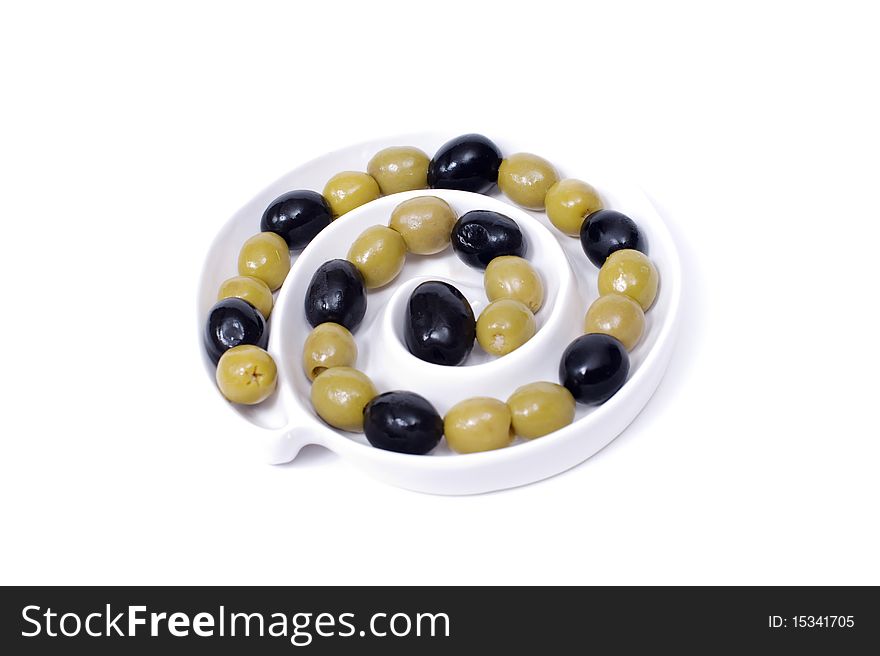 Olives on a plate isolated on a white background