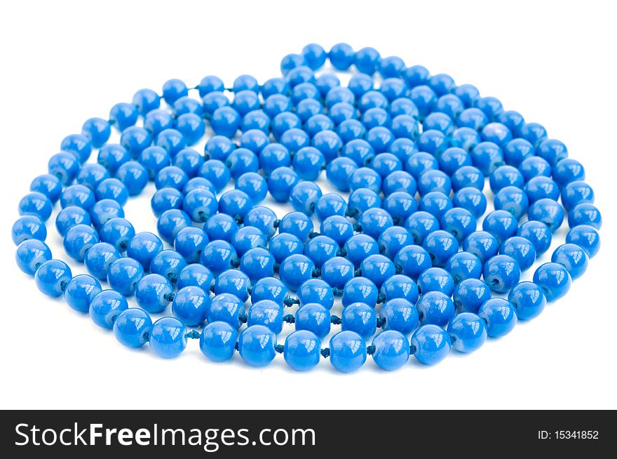 Blue beads on a white background