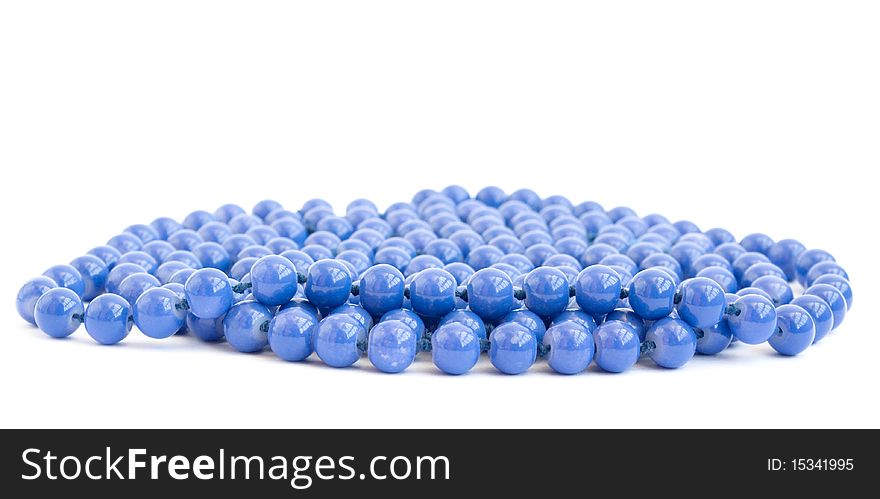 Blue beads on a white background