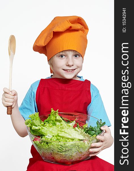 Portrait of the small cook on a light background