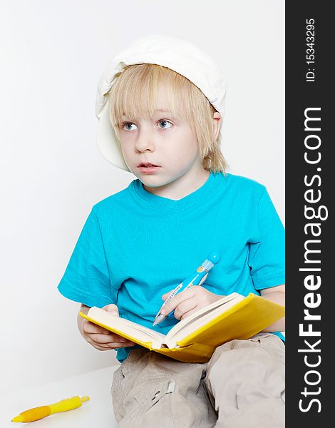 The Boy Of Preschool Age With Book