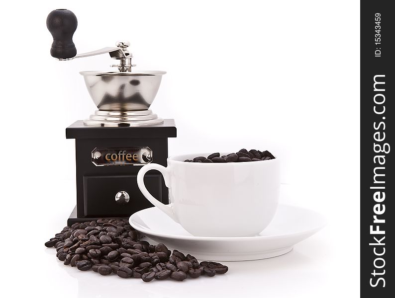 Coffee Grinder beans and Cup over white