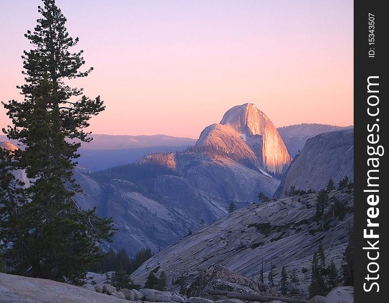 A view of Half Dome at sunset as seen from Olmstead Point - Yosemite National Park, California