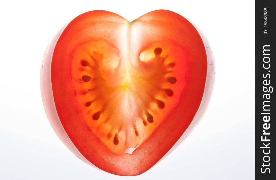 Beautiful tomato in heart shape. Beautiful tomato in heart shape.