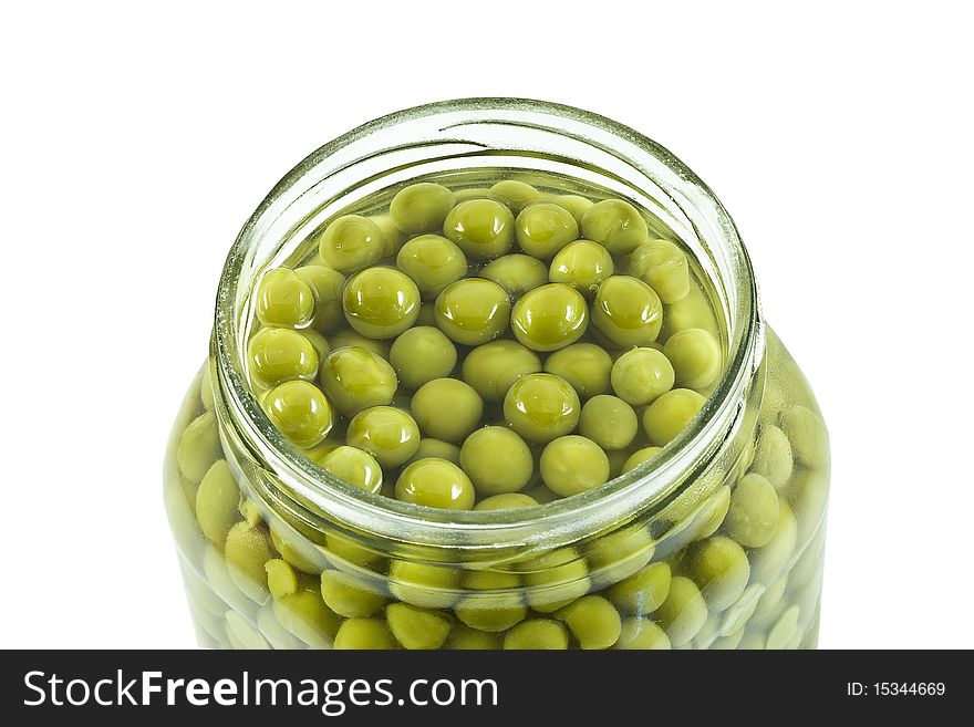 Pea beans in the opened glass jar. Pea beans in the opened glass jar