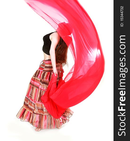 Young girl dancing with red scarf over white