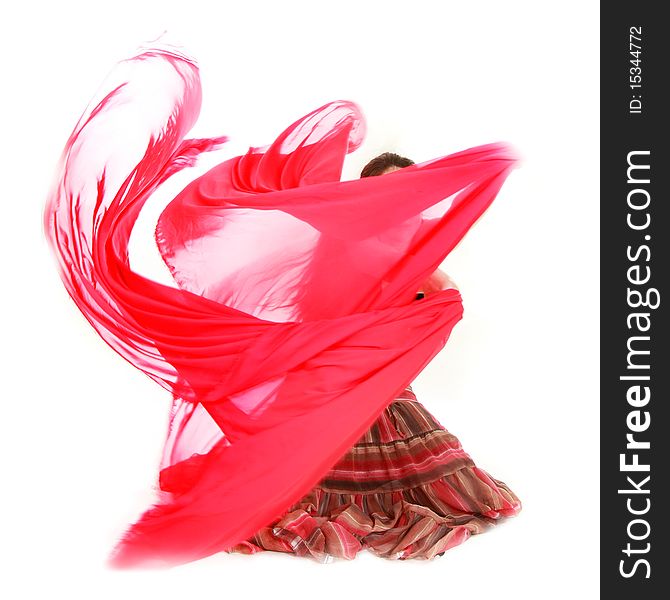 Young girl dancing with red scarf
