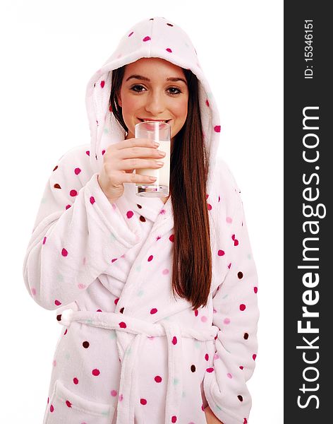 Woman drinking milk in dressing gown