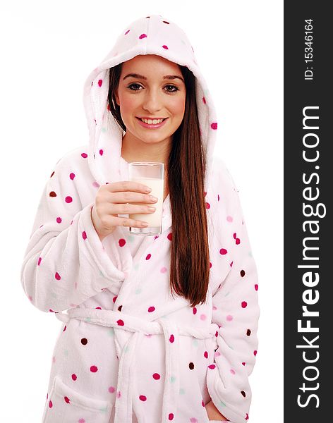 Woman holding a glass of milk in dressing gown. Woman holding a glass of milk in dressing gown