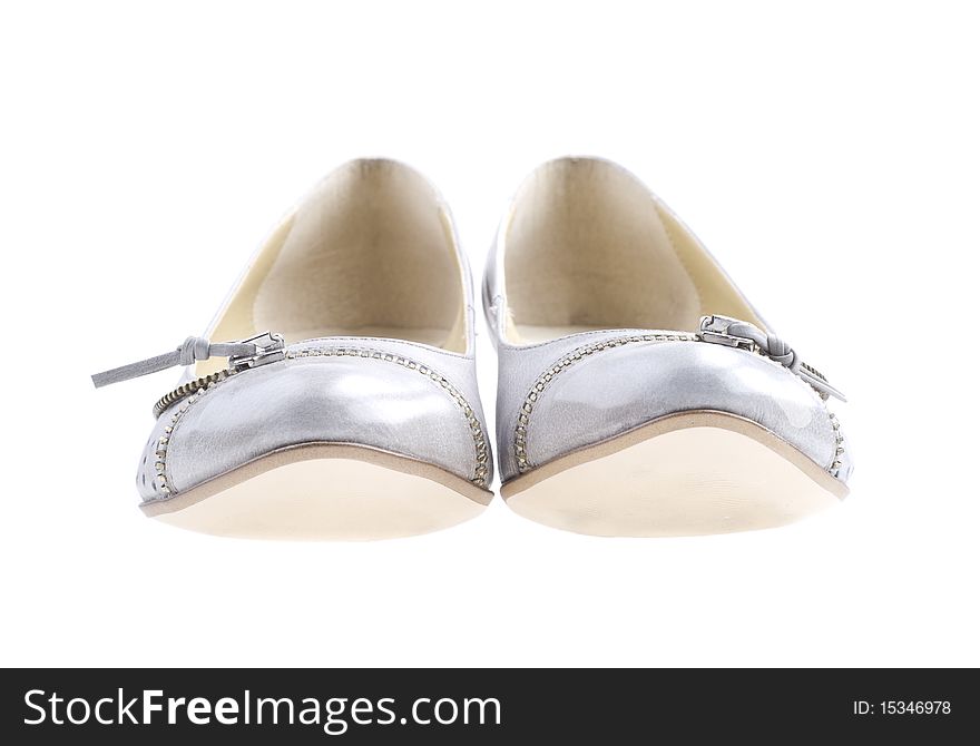 Pair of gray shoes on a white background