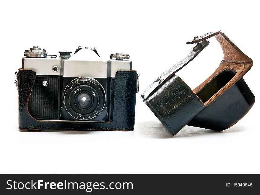 Old manual film camera and bag isolated on white background. Old manual film camera and bag isolated on white background