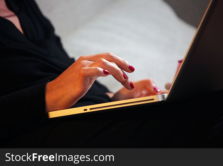 Woman Hands Working On Laptop Until Late