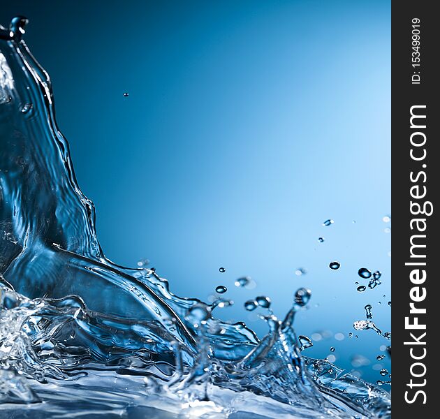 Abstract Splash of Water on a Blue Background