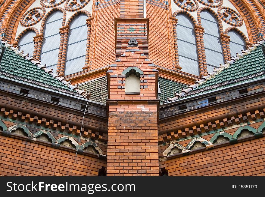 Red Bricks Church, brick wall, design windows, old building in Czech Republic, Breclav