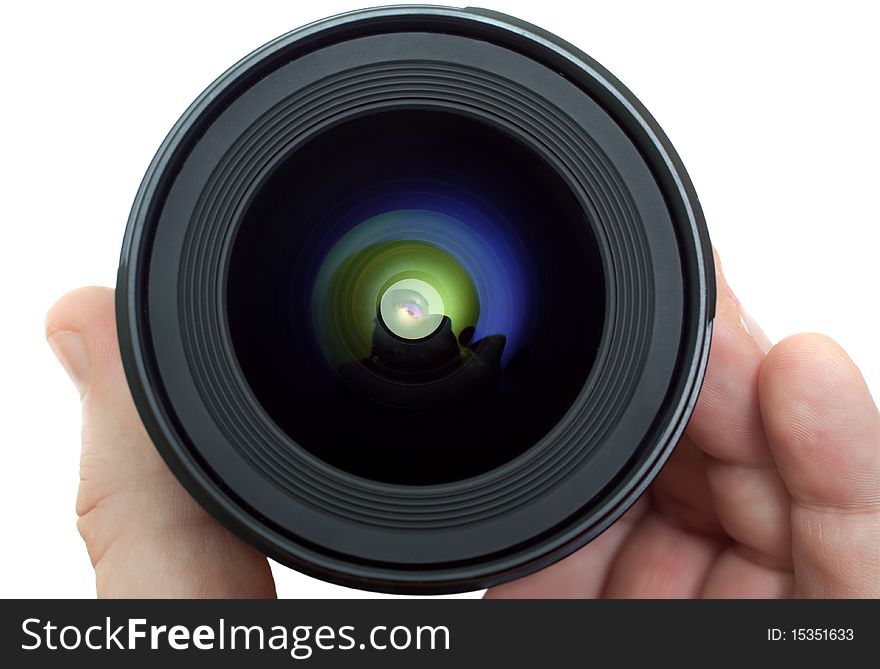 Lens in a man's hand isolated on white