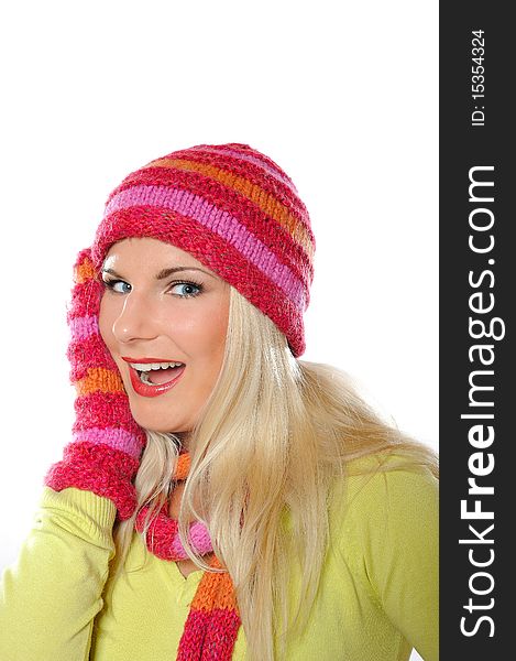 Seasonal portrait of pretty funny woman in hat and gloves smiling. white background. Seasonal portrait of pretty funny woman in hat and gloves smiling. white background