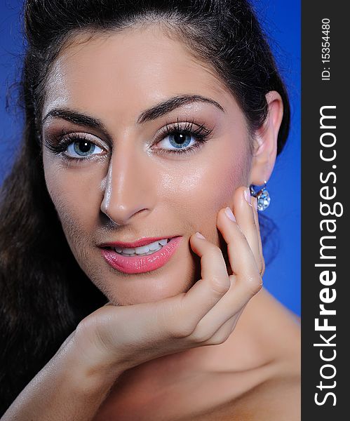 Beauty portrait of pretty woman with pure skin and natural make-up. copy-space