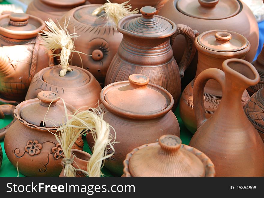 Handmade clay pots market outdoors. Handmade clay pots market outdoors.