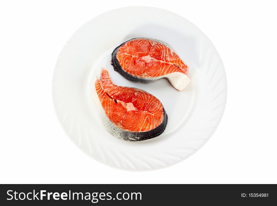 Slices of a fresh crude salmon isolated on a white background