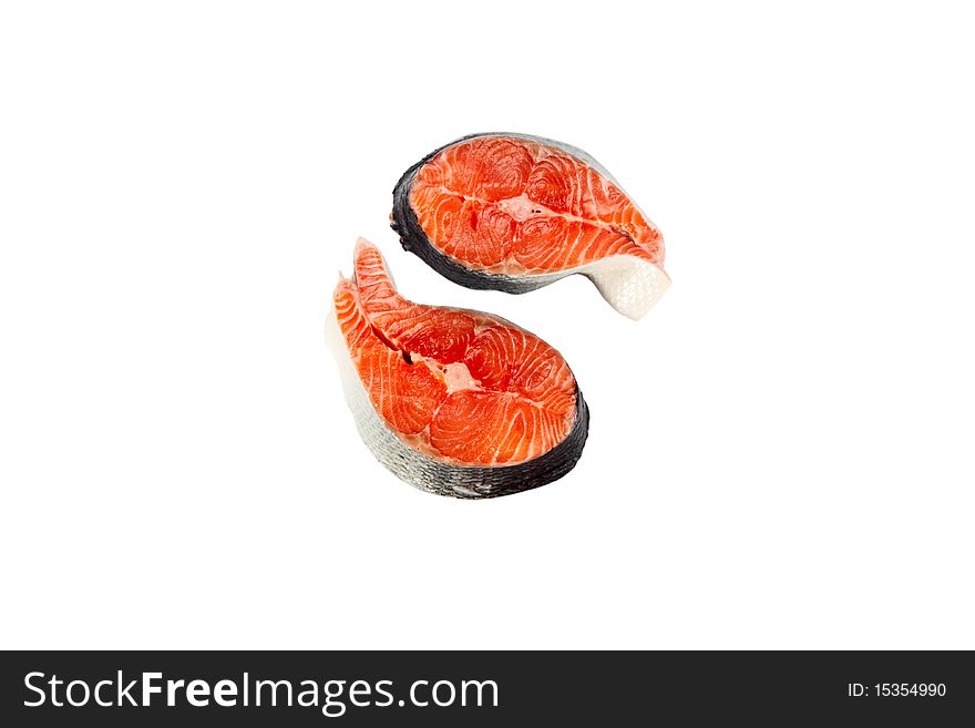 Slices of a fresh crude salmon isolated on a white background