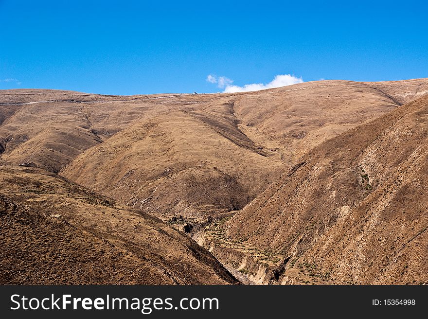 Yellowish mountain road view in tibet of China