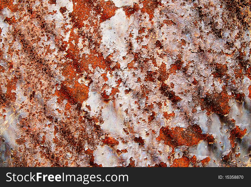 Grunge texture of old wall with rusty spots.