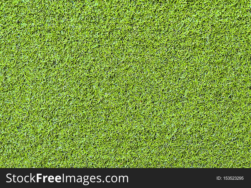 Astroturf carpet with top view and artificial green sod grass texture with seamless background. Astroturf carpet with top view and artificial green sod grass texture with seamless background
