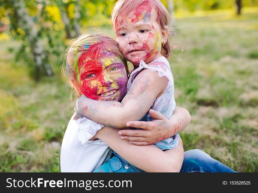 Portrait Of The Sisters, Painted In The Colors Of Holi.