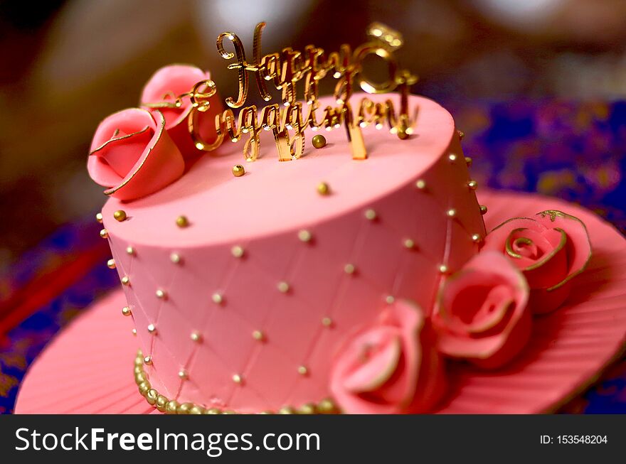 Engagement cakes with nice decorative creamy flower