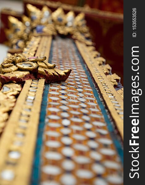 Close up of decoration details from the Emerald Buddha temple in Bangkok with copy space