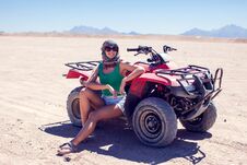 Woman On The Quad Bikes In The Desert Royalty Free Stock Photography