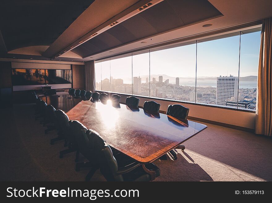 An interior shot of meeting room in a business building with a beautiful view of  downtown SF