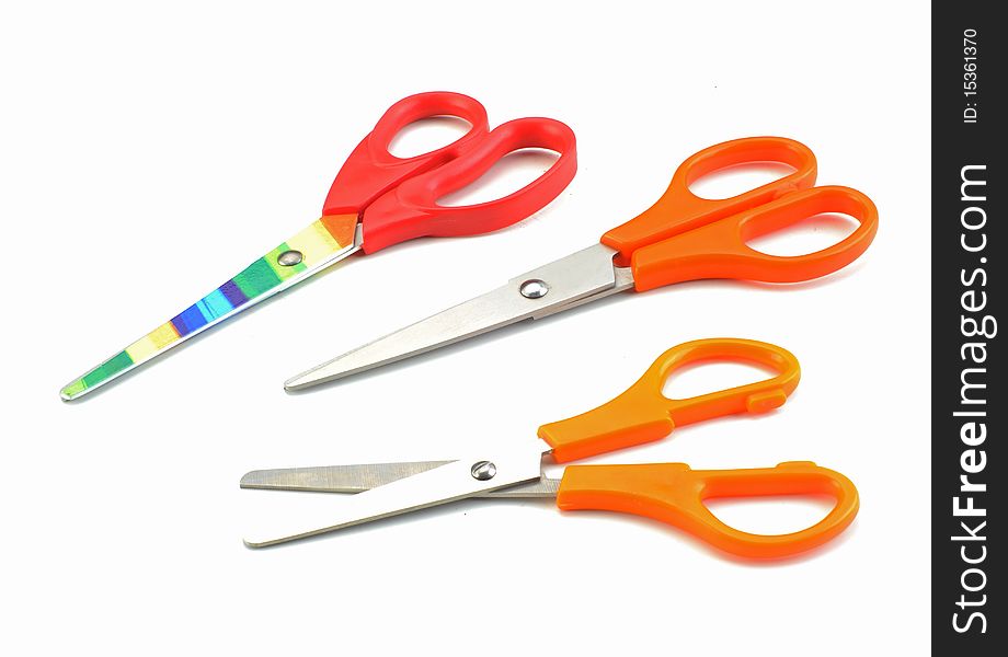 Three scissors isolated in white