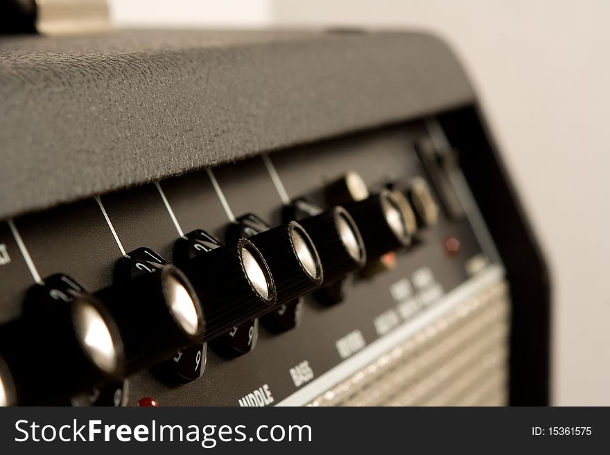 Closeup of control knobs on a guitar amplifier. Closeup of control knobs on a guitar amplifier