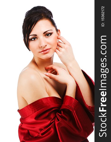 Picture of sensuality young woman in red gown on white background.