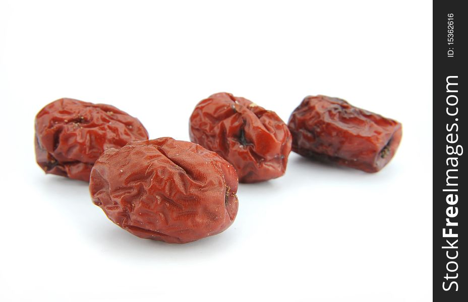 Close-up red jujube isolated in white