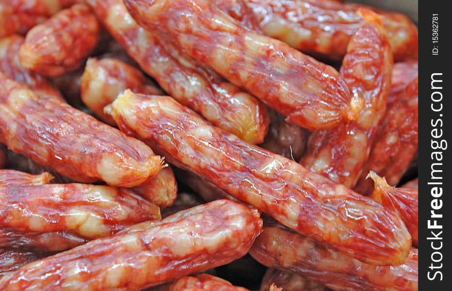 In the market sells Chinese sausage. In the market sells Chinese sausage