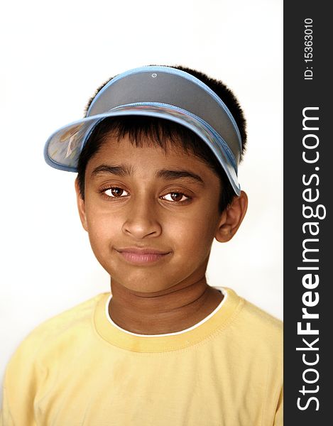 An handsome Indian kid smiling on the screen